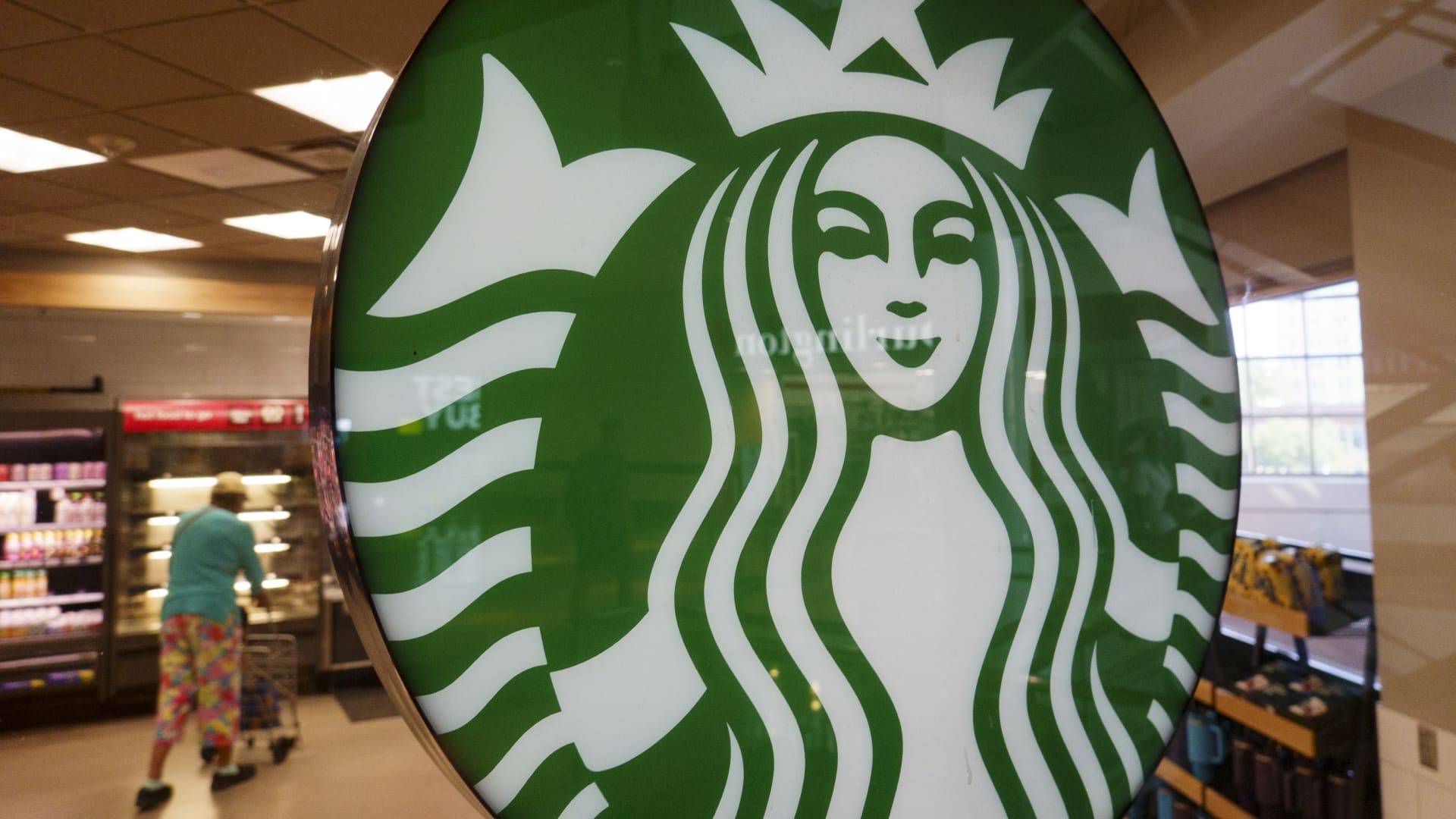 Starbucks stock jumps as coffee giant raises full-year outlook