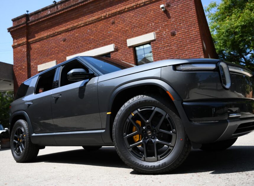 Rivian reduces 2026 spending plans, narrows earnings guidance