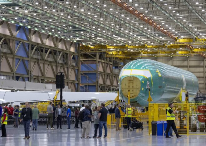 Boeing narrows third-quarter loss as defense sales rise, but focus remains on 737 Max production