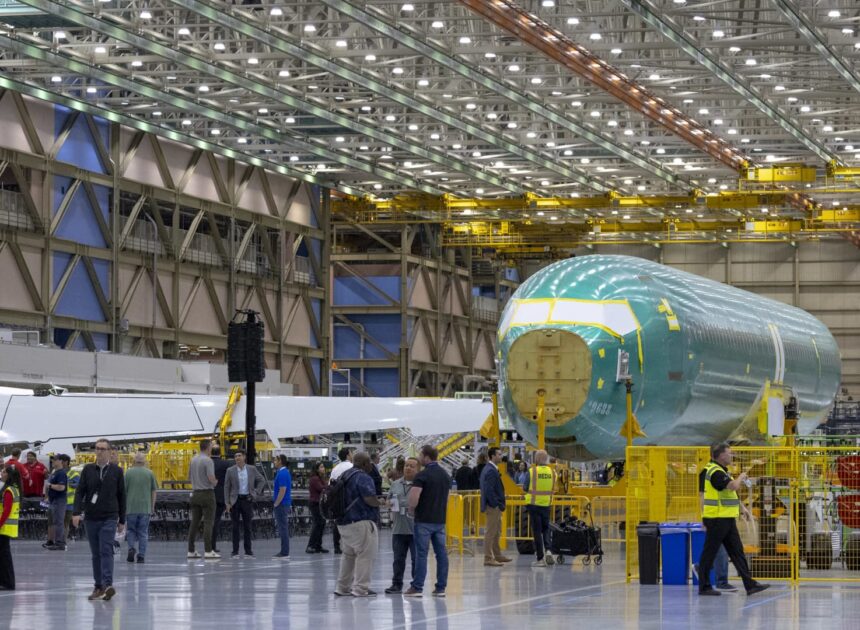 Boeing narrows third-quarter loss as defense sales rise, but focus remains on 737 Max production